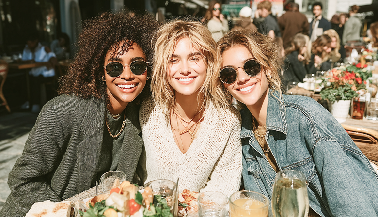 u2222635121_Three_stylish_friends_having_brunch_outdoors_in_S_b18ba83e-b3c3-4383-bf5b-1af3b7c39d5a_1 1